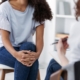 Image of a woman sitting in a chair speaking with a therapist. Uncover your BPD symptoms and learn how to heal from them with the help of EMDR therapy in Las Vegas, NV.