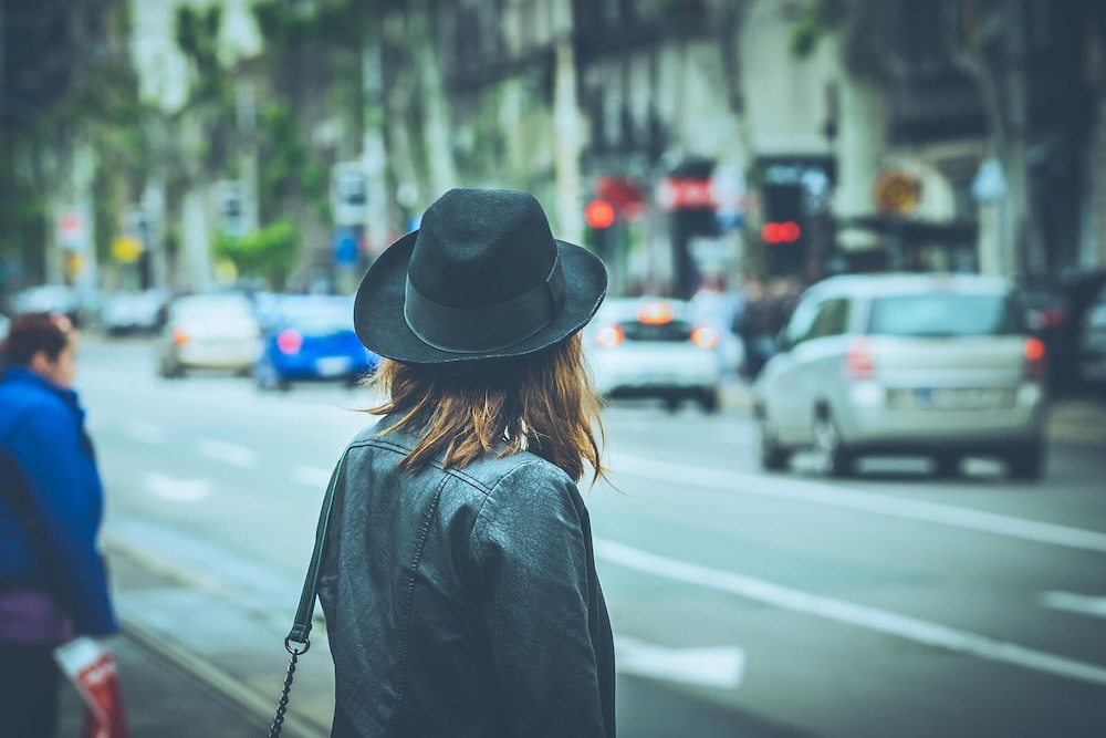 Image of a woman standing on the sidewalk looking at traffic in a busy city. Do you struggle with relationships and BPD? Learn how effective borderline personality disorder therapy in Las Vegas, NV can help you strengthen your connections.