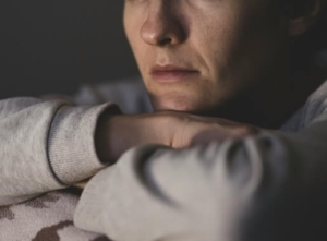 Image of a tired woman resting her head on her arms. Work with a skilled EMDR therapist to get to the root of your nightmares with EMDR therapy in Las Vegas, NV!