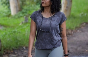 Image of a young woman walking through the forest on a path. Learn effective ways to cope with your personality disorder with EMDR therapy in Las Vegas, NV.