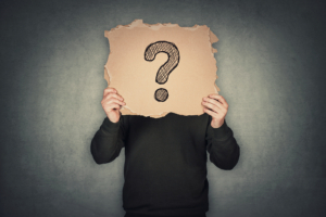 A person holds a cardboard cutout with a question mark covering their face. Learn more about how an EMDR therapist in Torrance, CA can offer support via EMDR therapy in Las Vegas, NV and California. Search for EMDR therapy for anxiety in Las Vegas, NV to learn more.