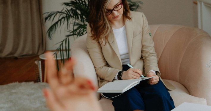 Picture of a therapist taking notes during a therapy session. If you’re ready to join a DBT skills group in Las Vegas, NV, we welcome you to contact our office and schedule a consultation to learn more.