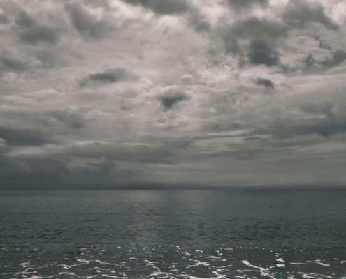 Dark clouds hover above the ocean, reflecting inner emotional storms that EMDR therapy can help process. Through EMDR therapy in Las Vegas, NV, individuals learn to face painful memories while building resilience and inner calm.