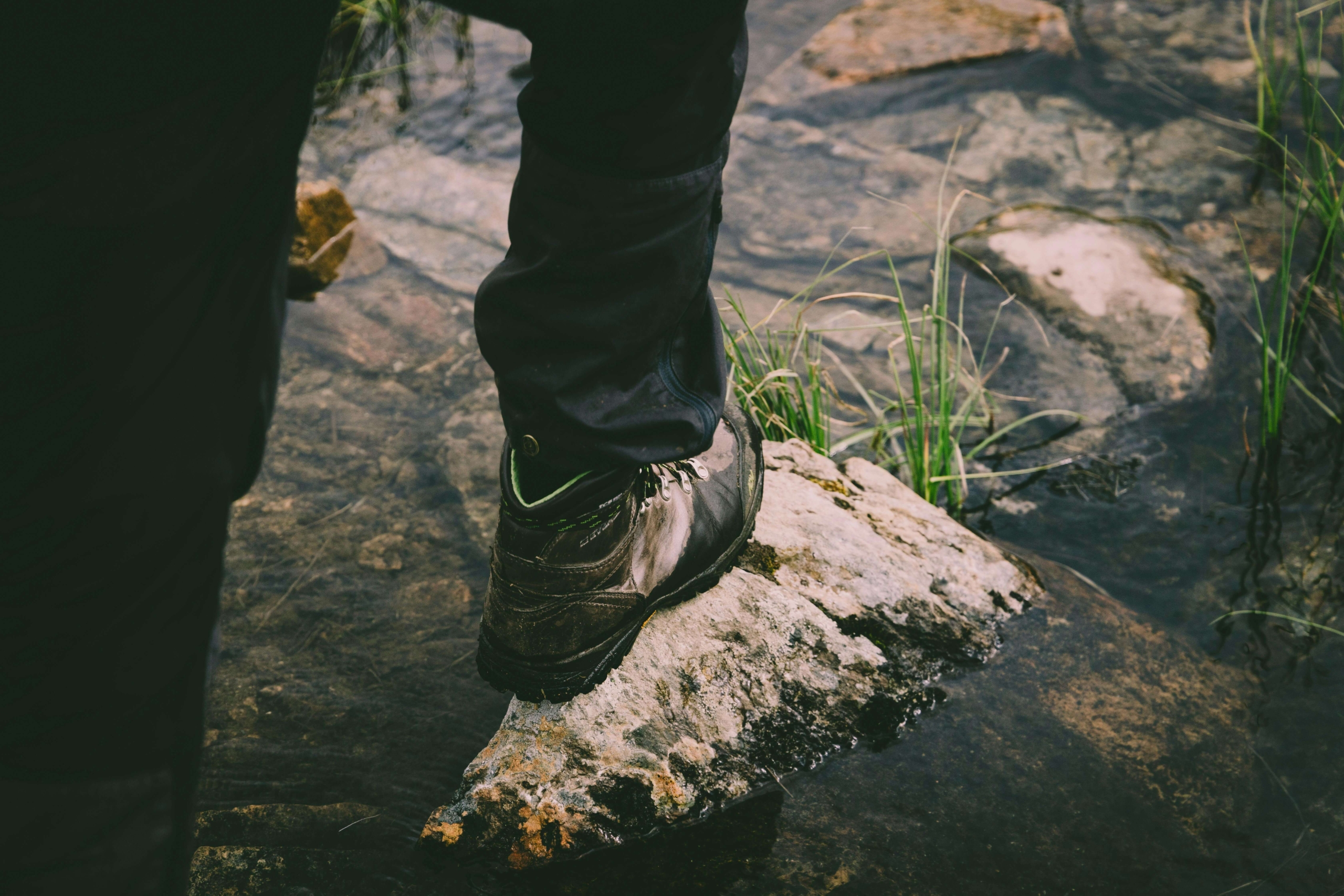 A man stepping carefully on rocks across a stream. Want to learn how to practice DBT skills to navigate life’s challenges with confidence? A DBT therapist in Las Vegas, NV, can help you develop coping strategies through DBT group therapy.