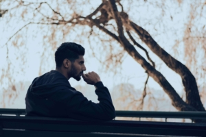 A man sits alone on a park bench, thinking quietly. If you feel like you’re struggling, therapy for men can help you feel more confident and grounded. Online DBT therapy in Torrance, CA, helps men build strength and steadier ways to cope.