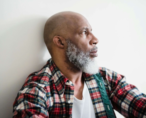 An older man gazes to the side with tension in his expression, reflecting inner conflict addressed through Therapy for men. Are you considering whether a DBT therapist in Torrance, CA, could help you reconnect with calmer choices? Tools for grounding can shift anger into insight.