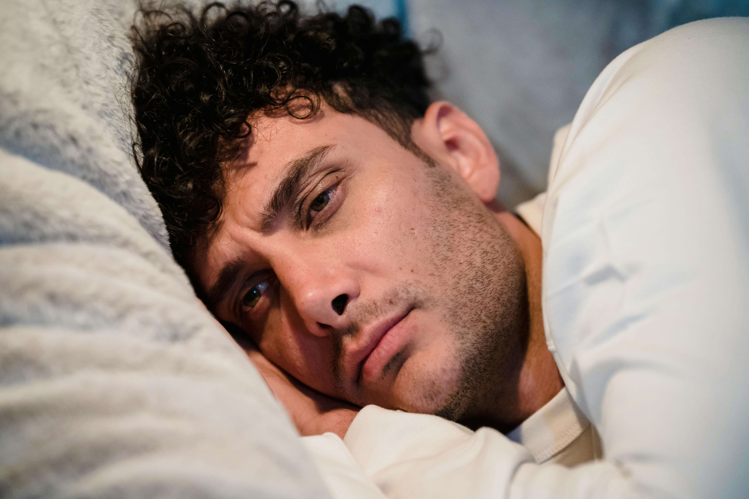 A man lies awake with worry in his eyes, showing the hidden exhaustion that Therapy for men can help address. Are you wondering whether working with a DBT therapist in Torrance, CA, could ease anger that surfaces as stress? Guided skills can bring emotional balance back into reach.