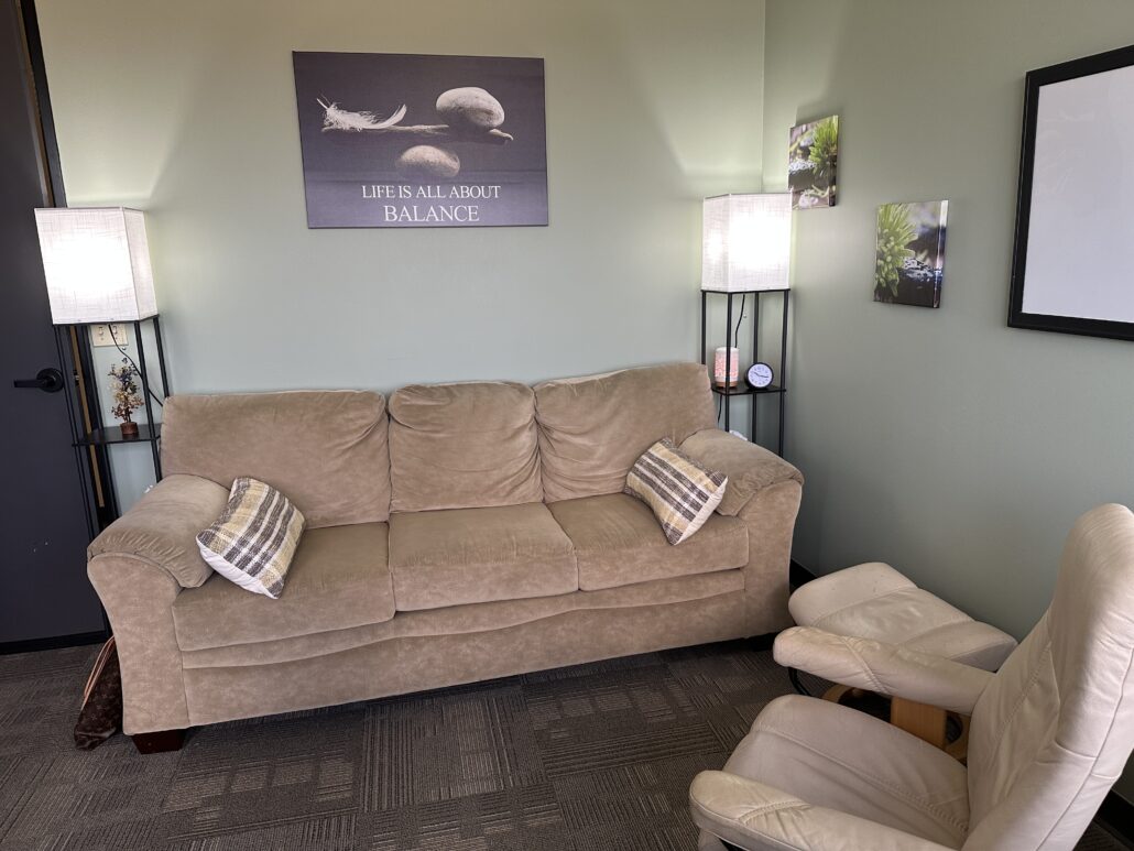 Comfortable therapy couch and seating area at Integrative Path Therapy Torrance